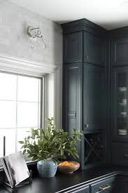 A dark and moody kitchen!! Contact Studio V Interiors