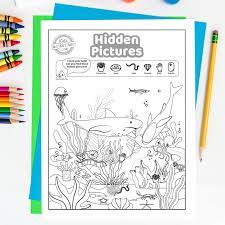 Get your free hidden pictures pages at all kids network. Free Printable Hidden Object Pictures Puzzle Sharks Kids Activities Blog
