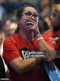 Hillary Clinton supporter Celinda Pena reacts as she watches the... News  Photo