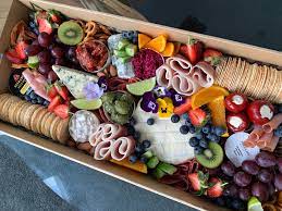 We believe that food brings people together, and there's nothing quite like a grazing table to accomplish this. Grazing Platter Boxes And Gifts By Grazing Tables Melbournegrazing Tables Grazing Boards Grazing Boxes Grazing Gift Box Grazing Desserts Cheese Towers