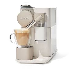 Next, you need to remove the coffee machine's water tank followed by filling it with the descaling solution (100ml) and then fresh water of 500ml. Nespresso Lattissima One Oprahs Favorite Things Nespresso Coffee Machine