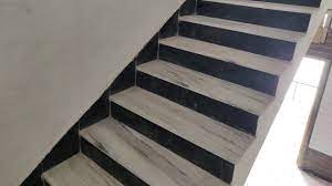 The elegance of marble lends luxury to the sleek and innovative staircase design. Black And White Indian Marble Staircase Design With Wall Tiles Design And Price Youtube