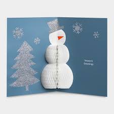 A small christmas tree pops up inside. 30 Pop Up Christmas Cards 2017