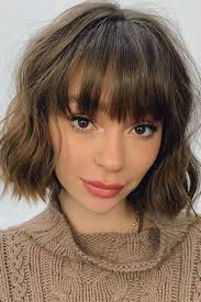 Layered hairstyles for long hair are not all alike, and you should try different textures and types of bangs for some variety and long hair with side bangs is perfectly proportional for a feathery cut. Fringe Hairstyles From Choppy To Side Swept Bangs Glamour Uk