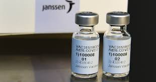 In this photo illustration a johnson & johnson logo is seen in front of a medical syringe and a vial. In Depth What We Know About The Johnson And Johnson Covid Vaccine Against The Delta Variant
