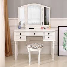 Bedroom vanities offer a great place to sit and prepare yourself for the day. Black Woman Dressing Table With 7 Drawers Makeup Table And Stool Set For Women Girls Bedroom Vanity Set With Tri Fold Mirror Vanity Makeup Table With Cushioned Stool Home Kitchen Com Furniture
