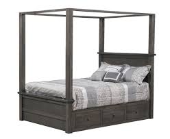 The pale blue walls keep the space soft and serene, while a custom bed frame made of bleached oak, designed by terri robison, is the centerpiece in this bedroom. Cabin Creek Bed With Canopy Ohio Hardwood Furniture