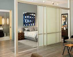 Sliding hanging room dividers can be used to conserve heat or air conditioning, depending upon the season. Enjoying Flexibility With Sliding Room Dividers
