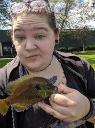 Lady fishing groups for local pond fishing