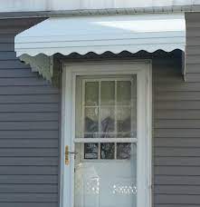 Add New Look To Your Exterior By Using Door Awnings Topsdecor Com Aluminum Awnings Door Awnings Door Canopy Kits