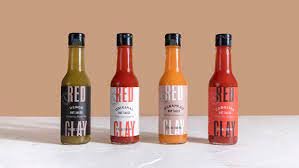 12 Bold Hot Sauce Packaging Designs Hot Sauce Packaging Hot Sauce Bottle Design Packaging