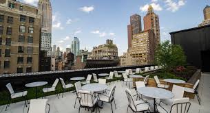 The Nomad Rooftop With Its Rustic Landscaped Garden And Copper Cupola Provides Sweeping Views Of The New York City Nomad Hotel Nyc Rooftop Luxury Hotels Nyc
