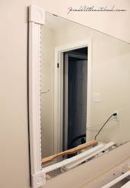 Decorative molding can completely change the look of any mirror. How To Frame Out That Builder S Grade Mirror The Easy Way Pink Little Notebookpink Little Notebook