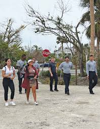 neighbors helping neighbors rebuild after life's storms