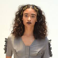 25 Bobby Pin Hairstyles You Haven T Tried But Should Glamour Bobby Pin Hairstyles Middle Part Curly Hair Middle Part Hairstyles