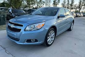 Image result for Silver Topaz 2013 Malibu