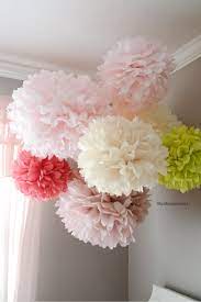 Focal accent wall with tissue paper flowers. Tissue Paper Pom Poms Tutorial Paper Decorations Diy Tissue Paper Pom Poms Tissue Paper Crafts