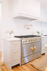 Ahead are 30 examples of two tone kitchen cabinets that make a strong case for abandoning uniformity. Grey Cabinets Brass Hardware Design Ideas