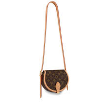 Classic monogram canvas with cowhide trim; Tambourin Small Round Lightweight Cross Shoulder Bag Louis Vuitton Louis Vuitton Louis Vuitton Store Cross Shoulder Bags