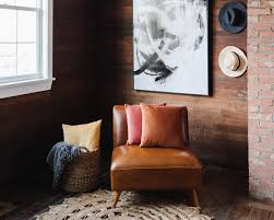 The largest shooting space is a 650 square foot area with light natural oak floors, 3 walls are white and one wall includes a deep navy wall and a dusty. The Loft Studio