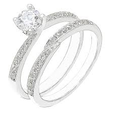 Yellow gold rings hold historical significance as a traditional choice and white gold is a lighter alternative to platinum. Diamond White Gold Wedding Engagement Ring Set