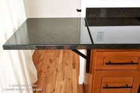 A Loft And Kitchen Renewed Kitchen Remodel Countertops Kitchen Design Countertops