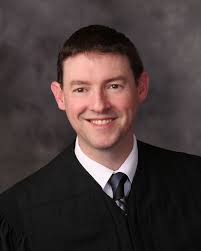 District Judge Daniel D. Gilligan