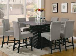 Additional chairs can be added to your order and there is a matching dining server. Stanton 5 Piece Counter Height Dining Set In Rich Black Finish By Coaster 102068