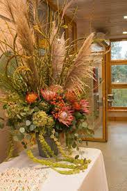 Rustic Arrangement Of King Protea Pampas Grass Fantail Curly Willow Rose Hips Hydrangea Silver Dollar Euc Pretty Flowers Rustic Arrangements Dried Flowers