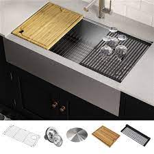 This asian inspired kitchen features one of our copper farmhouse workstation sinks with a custom linen patina and a waterstone contemporary faucet suite. Kraus Kore Apron Front Farmhouse Workstation Kitchen Sink Single Bowl 35 88 In Stainless Steel Lowe S Canada