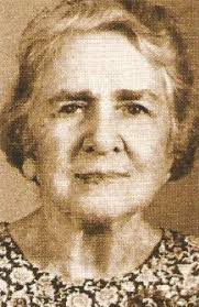 What are the details about Ms. Eloisa 'Lily' Perkins' life, family, and  teaching career at Munro College and Wolmer's?