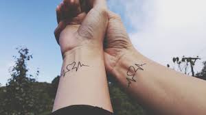 One popular idea is for each person to have half a heart. Couple Tattoos Should You Get One Racked