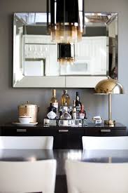 Youthful tradition for a bustling young family. Keeping Liquor Out In The Open 8 Home Bar Set Ups Mirror Dining Room Gold Dining Room Dining Room Buffet