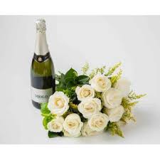 Making your special ones happy with our flowers gifts makes us happy too! Fortaleza Bouquet Of 15 White Roses And Sparkling Wine Flower Delivery 15 White Roses And Wine Flower Delivery Fortaleza Online Florist Fortaleza