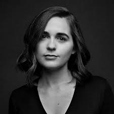 17 enamel pins made by women