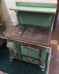 The Majestic Antique Wood Cook Stove In Green Wood Stove Cooking Wood Stove Decor Wood Stove