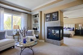 A Corner Fireplace Links The Sitting Area To This Elegant Owner S Suite The Harlow Plan Master Suite Bedroom Master Bedroom Sitting Area Master Bedrooms Decor