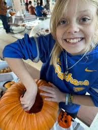 We went to the St. Peter's Lutheran Church Evans City PA PumpkinFest last  night. The girls look forward to carving their pumpkins every year, and I  look forward to avoiding the mess