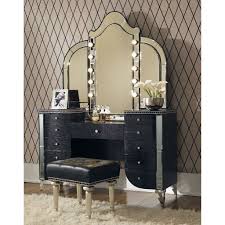 Compact setup for an impromptu vanity cabinet in a bedroom, made with the use of a dresser cabinet crafted out of solid wood with a white coat of paint with tree pattern. Vanity Dressing Table With Mirror And Lights Ideas On Foter