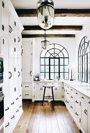 Add reflective cabinets to give a futuristic, modern feeling to your space, and. Pin By Lynyl Cullen Frost On Dream House Home Black White Kitchen House Interior