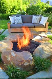 Pound a rebar stake into the ground at the center of the fire pit then mark the circumference of the circle. 35 Easy To Do Fire Pit Ideas And Designs That Are Also Inexpensive