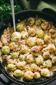 Creamy Cheesy Brussels Sprouts With Bacon Roasted Brussels Sprouts With Crispy Bacon Baked In A Cream Sprouts With Bacon Bacon Brussel Sprouts Sprout Recipes