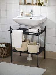 Easily adjustable, flexible shelf with gap for drains or pipes. Products Built In Bathroom Shelves Sink Shelf Under Sink Storage Ideas