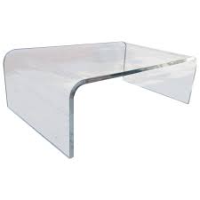 The table is beautifully made, the edges of the table have a beautiful bullnose edge. Lucite Waterfall Coffee Table At 1stdibs