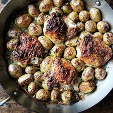 One Pan Roasted Chicken Thighs With Potatoes And Tarragon Recipe On Food52 Recipe Tarragon Recipes Pan Roasted Chicken Thighs Roasted Chicken Thighs
