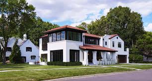 Arched windows span the front of this elegant mediterranean house plan that would fit perfectly in a florida locale. Modern Mediterranean Home On The Bluffs Overlooking The Mississippi River