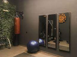 Reimagine a drab basement into a functional home gym, like this look from kirsten kaplan of haus interior design. Stay Fit Indoors How To Create That Perfect Small Home Gym