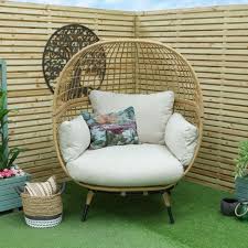 A reclining garden chair can give you the perfect place to relax in your back garden, ideal for a summer afternoon. Oren Havana Rattan Love Chair