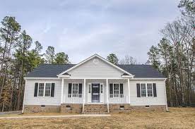 Choose from a variety of options, including shutters, gable vents, and mounting blocks as well as moldings and. Brand New Rancher With A Roof Over The Front Porch And Gray Vinyl Siding We Love The Black Shutte Vinyl Siding House White Siding House House Paint Exterior