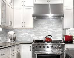 You can also use broken pieces of glass and the best part of a mosaic tile backsplash is that it allows room for the creative homeowner to add a unique, artistic flair to a kitchen area. White Glass Tile Backsplash Kitchen Home Design